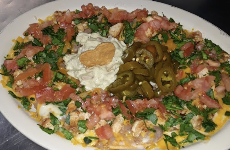The Cove signature dishes Bean and Cheese Nachos
Lisa Special
Super Nachos